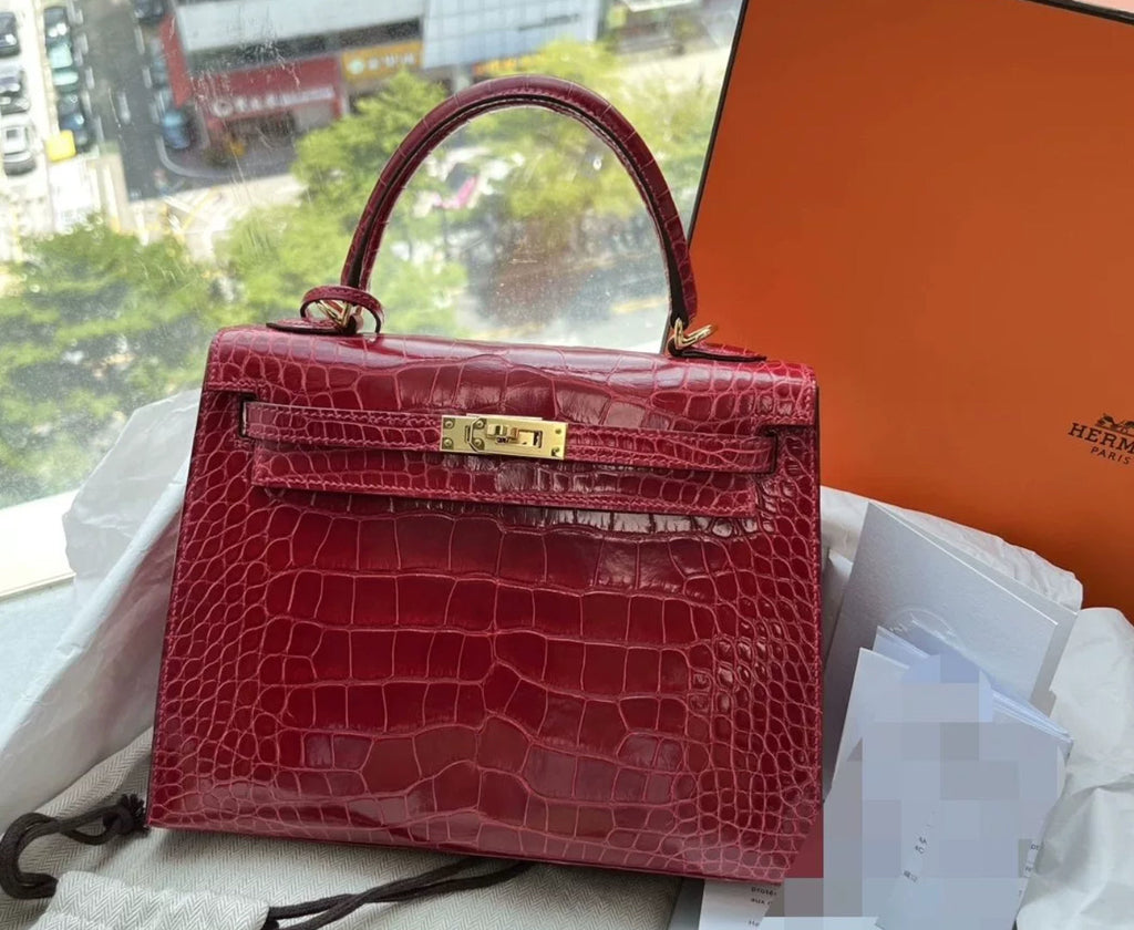 Hermès Kelly 25 red shiny crocodile leather gold hardware