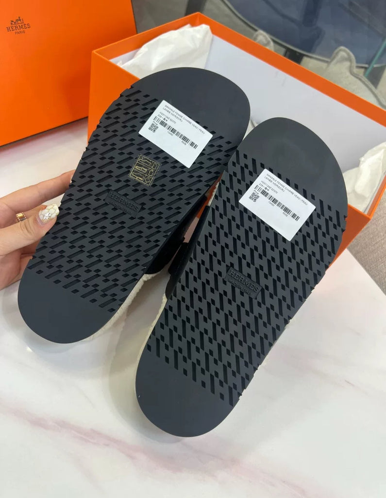 Hermès Black Leather Shearling Chypre Sandals