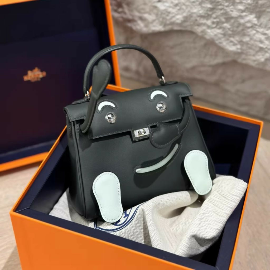 Hermès kelly doll dark green Swift Leather Palladium hardware