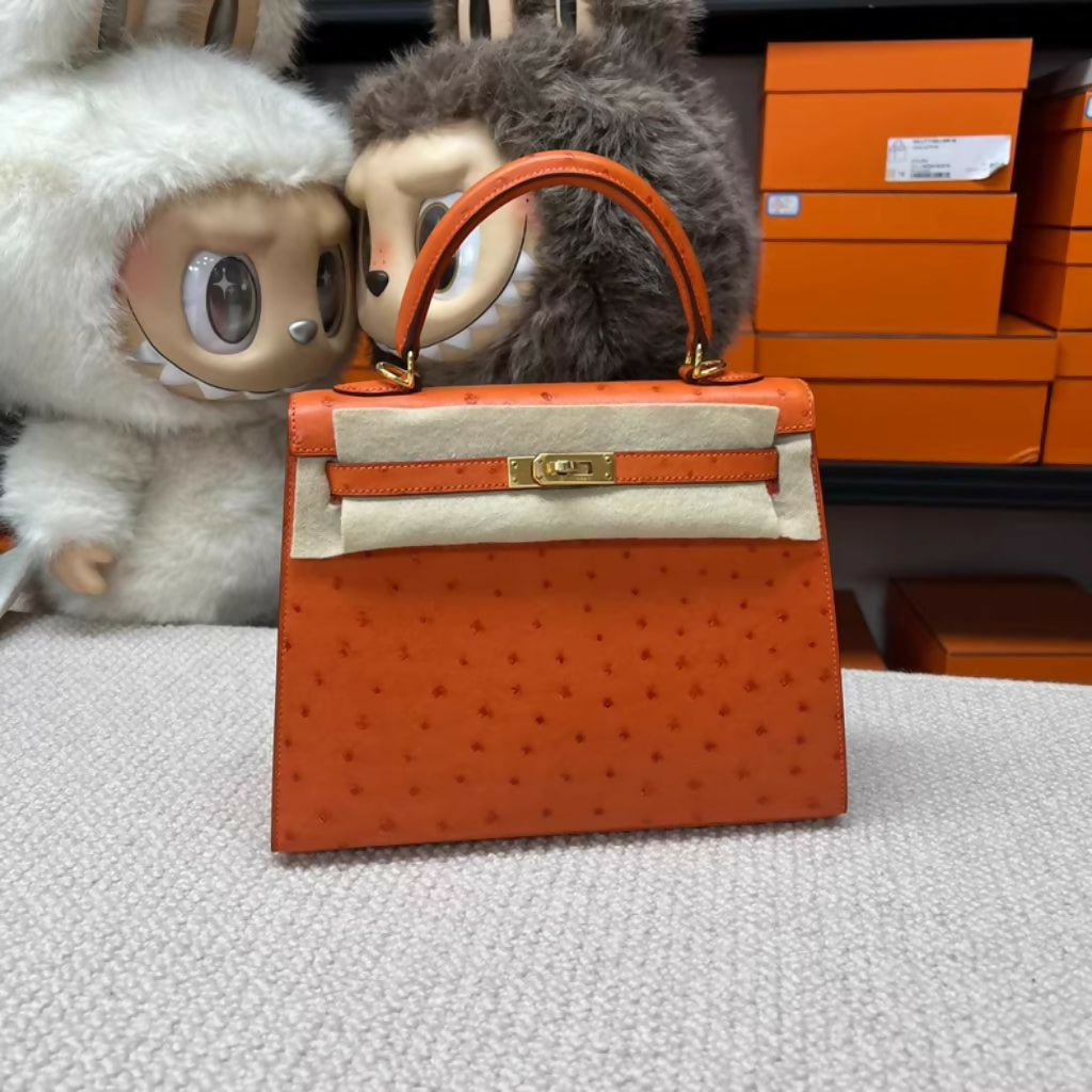 Hermès Kelly 25 Tangerine Orange Ostrich Leather with Gold Hardware
