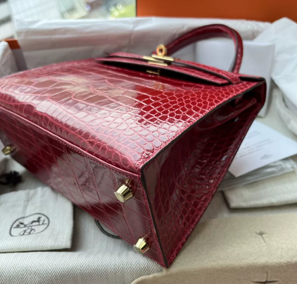 Hermès Kelly 25 red shiny crocodile leather gold hardware