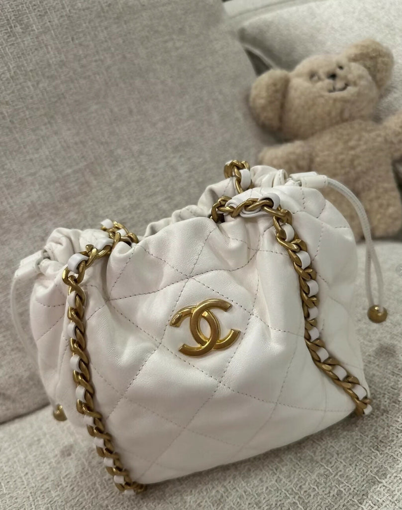Chanel 22P ecru leather gold chain bucket bag