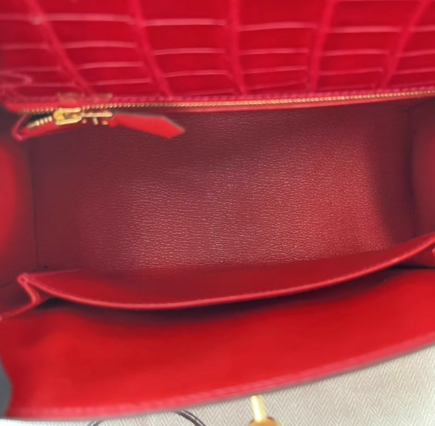 Hermès Kelly 25 red shiny crocodile leather gold hardware