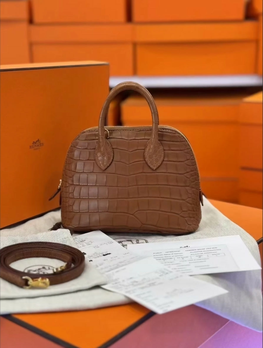 HERMÈS Matte Alligator Bolide 1923 Mini crossbody bag in Gold with Gold hardware