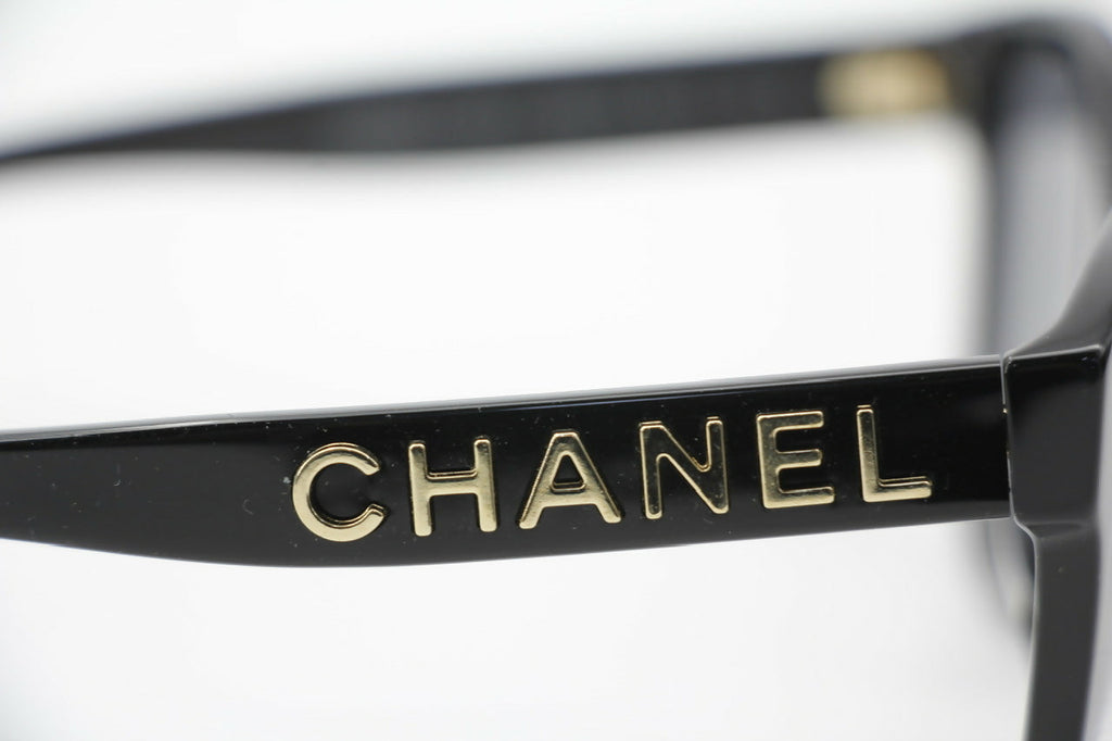 Chanel 2021 Resin Black with Gold-Tone Lettering Sunglasses