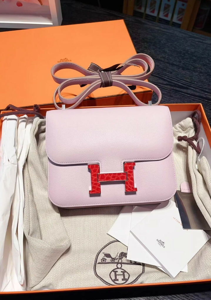 Hermes constance mini touch Mauve Pale evercolor leather with red alligator hardware