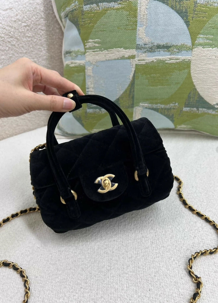 Chanel black velvet mini top handle bag