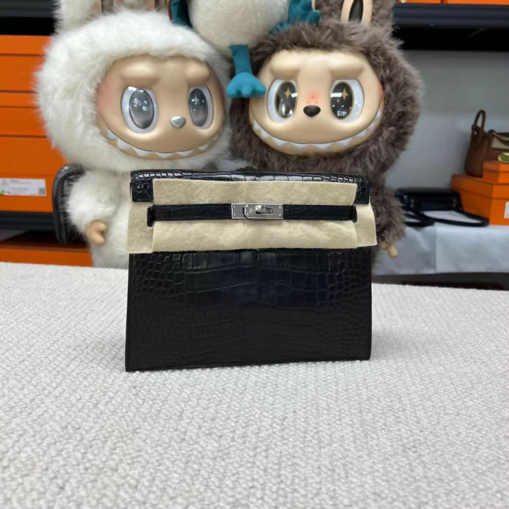 Hermès Kelly Danse Black Matte Crocodile with palladium hardware