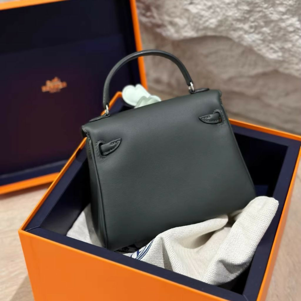 Hermès kelly doll dark green Swift Leather Palladium hardware