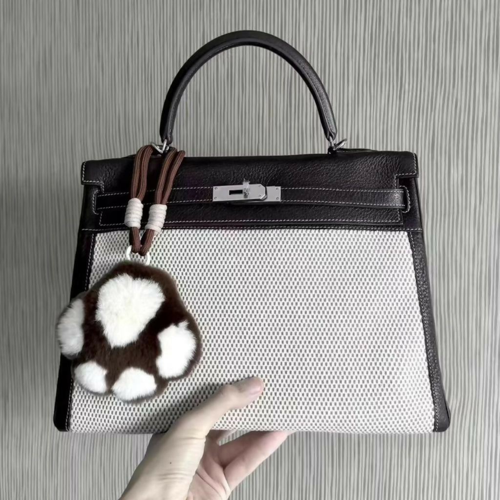 Hermès Kelly 32 Ebony togo leather and Silver-Studded Canvas with palladium hardware