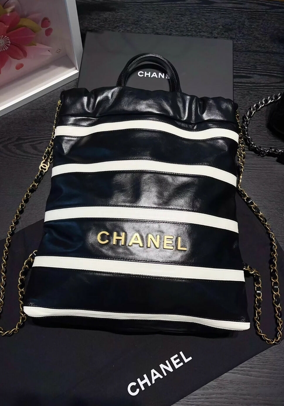 Chanel 24S black & white leather backpack with gold hardware