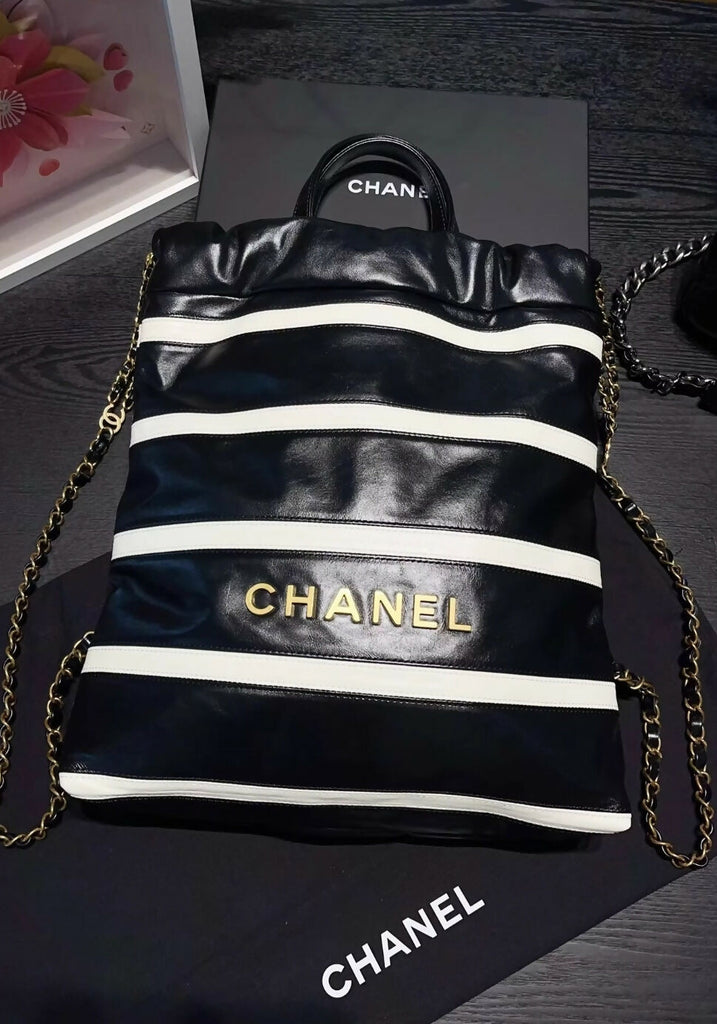 Chanel 24S black & white leather backpack with gold hardware