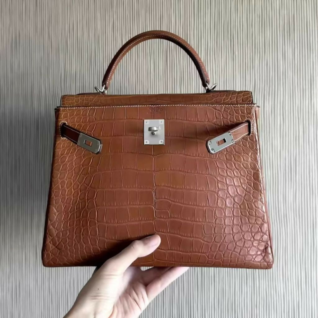 Hermès Kelly Saddle Crocodile Fauve Barenia leather palladium hardware