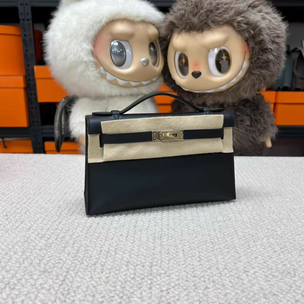 Hermès Mini Kelly Pochette Black Swift Leather Champagne Gold Hardware
