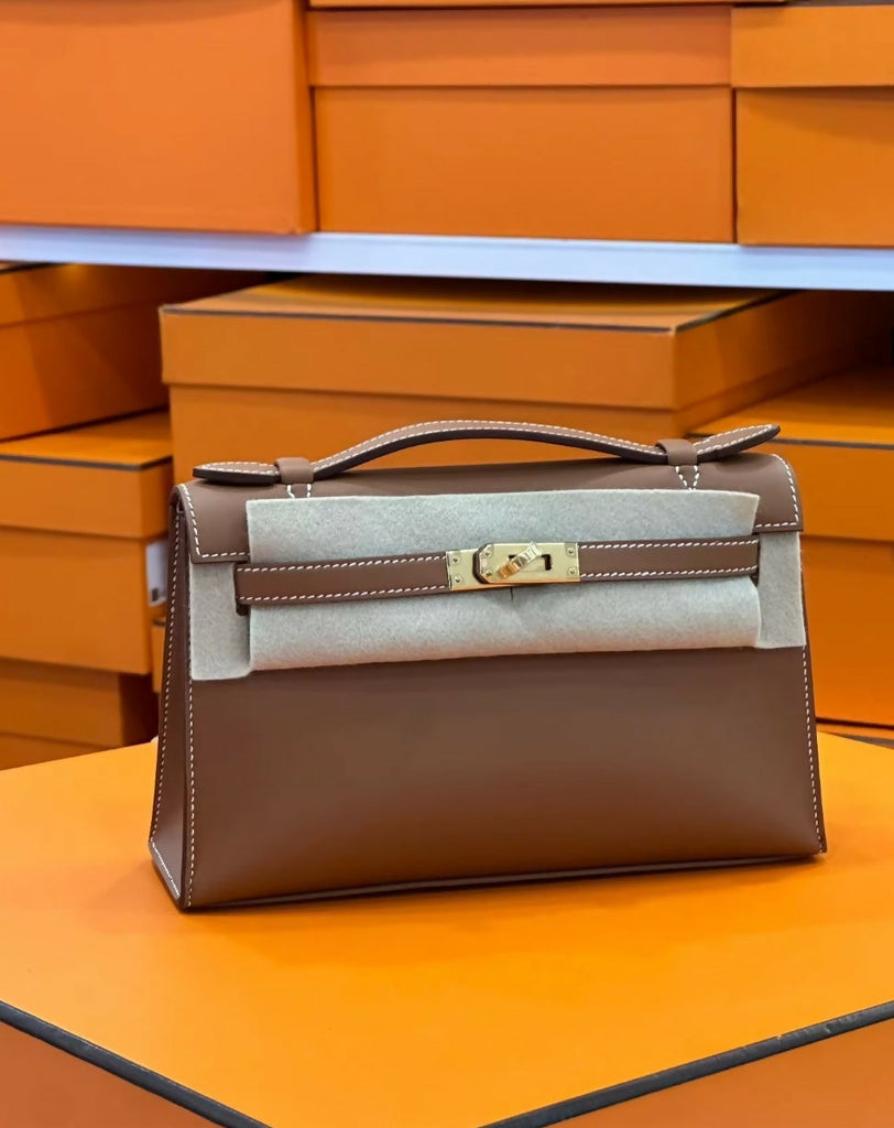 Hermès Kelly Pochette Gold Swift leather Gold hardware