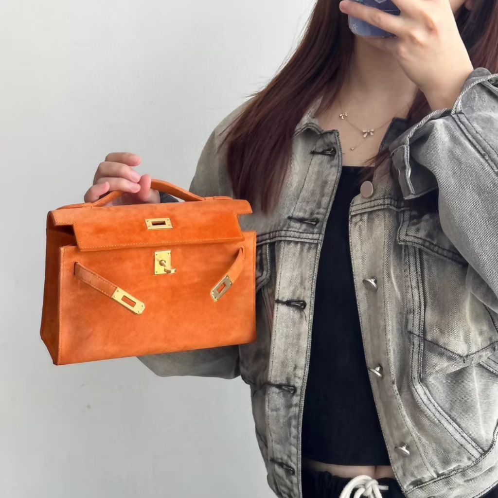 Hermès Mini Kelly pochette Orange doblis gold hardware