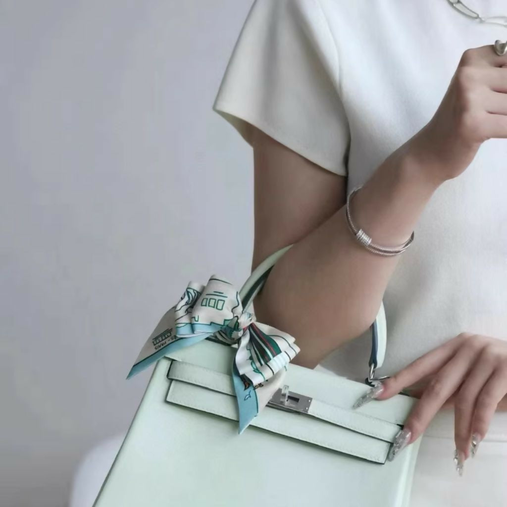 Hermès Kelly 25 Very fizz Swift Leather with Palladium Hardware