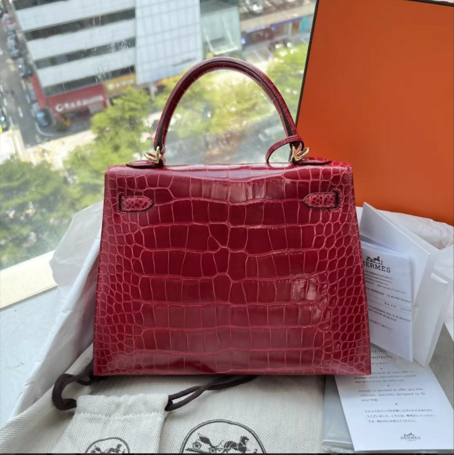 Hermès Kelly 25 red shiny crocodile leather gold hardware