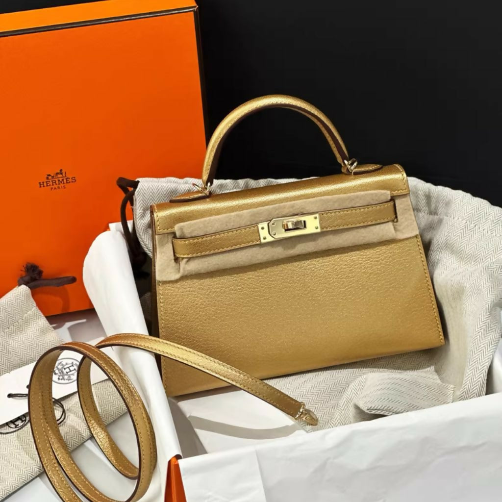 HERMÈS KELLY 20 MINI SELLIER OLYMPIC GOLD METALLIC DORÉ CHEVRE CHAMKILIGHT GOLD HARDWARE