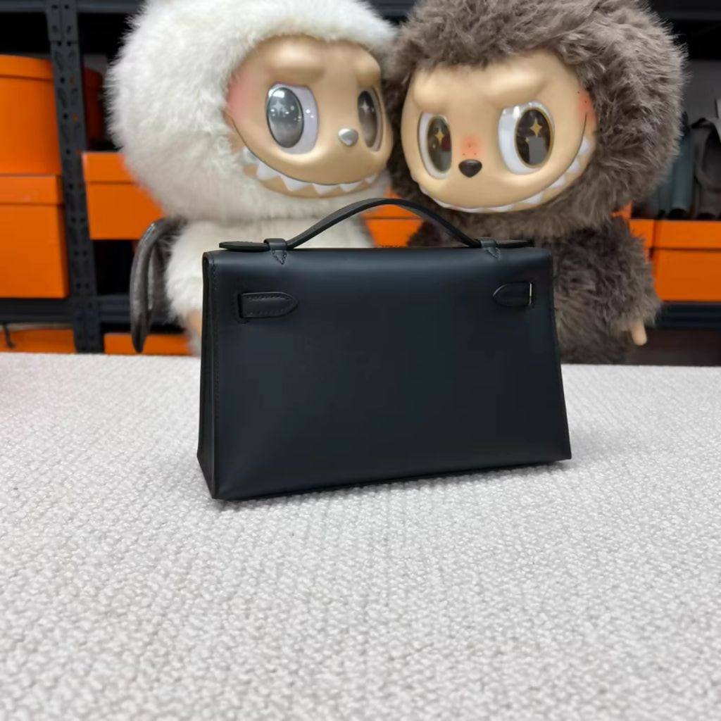 Hermès Mini Kelly Pochette Black Swift Leather Champagne Gold Hardware