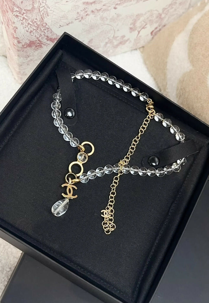 Chanel 24S coco letter double cc transparent pearl necklace