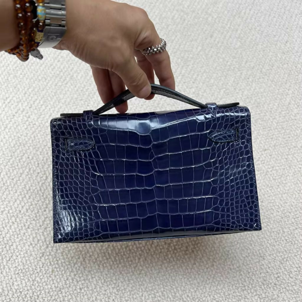 Hermès Mini Kelly Blue Shiny Crocodile with Gold Hardware