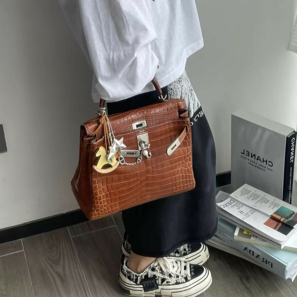 Hermès Kelly 28 Saddle Crocodile leather palladium hardware