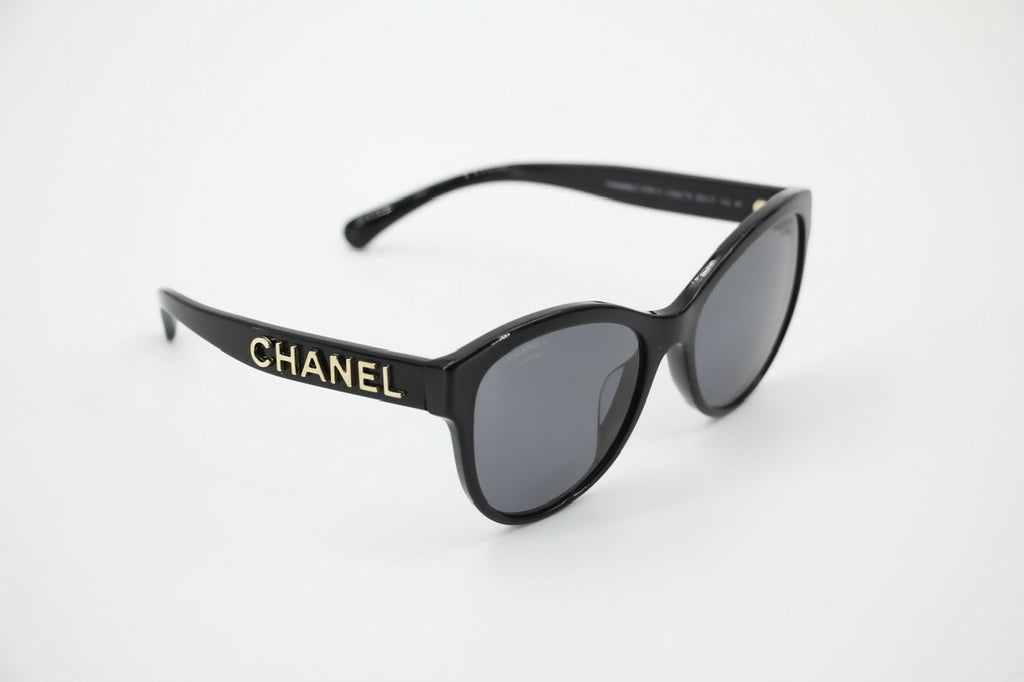 Chanel 2021 Resin Black with Gold-Tone Lettering Sunglasses