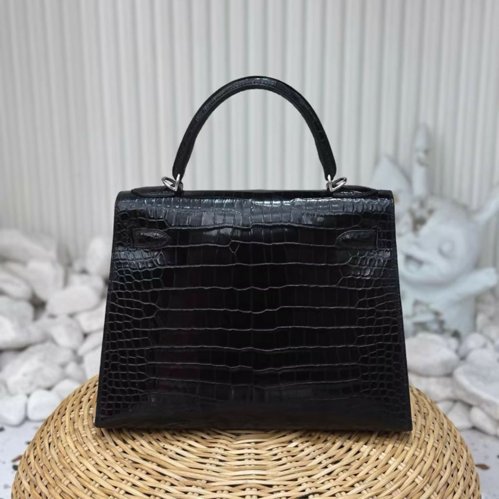 Hermès Kelly 28 black shiny alligator leather palladium hardware