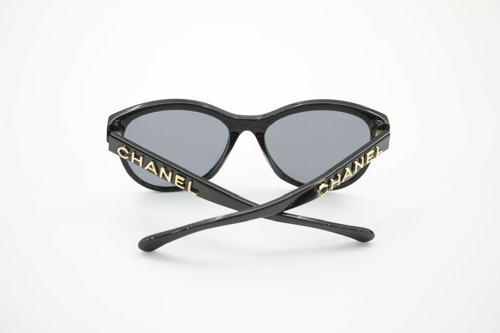 Chanel 2021 Resin Black with Gold-Tone Lettering Sunglasses