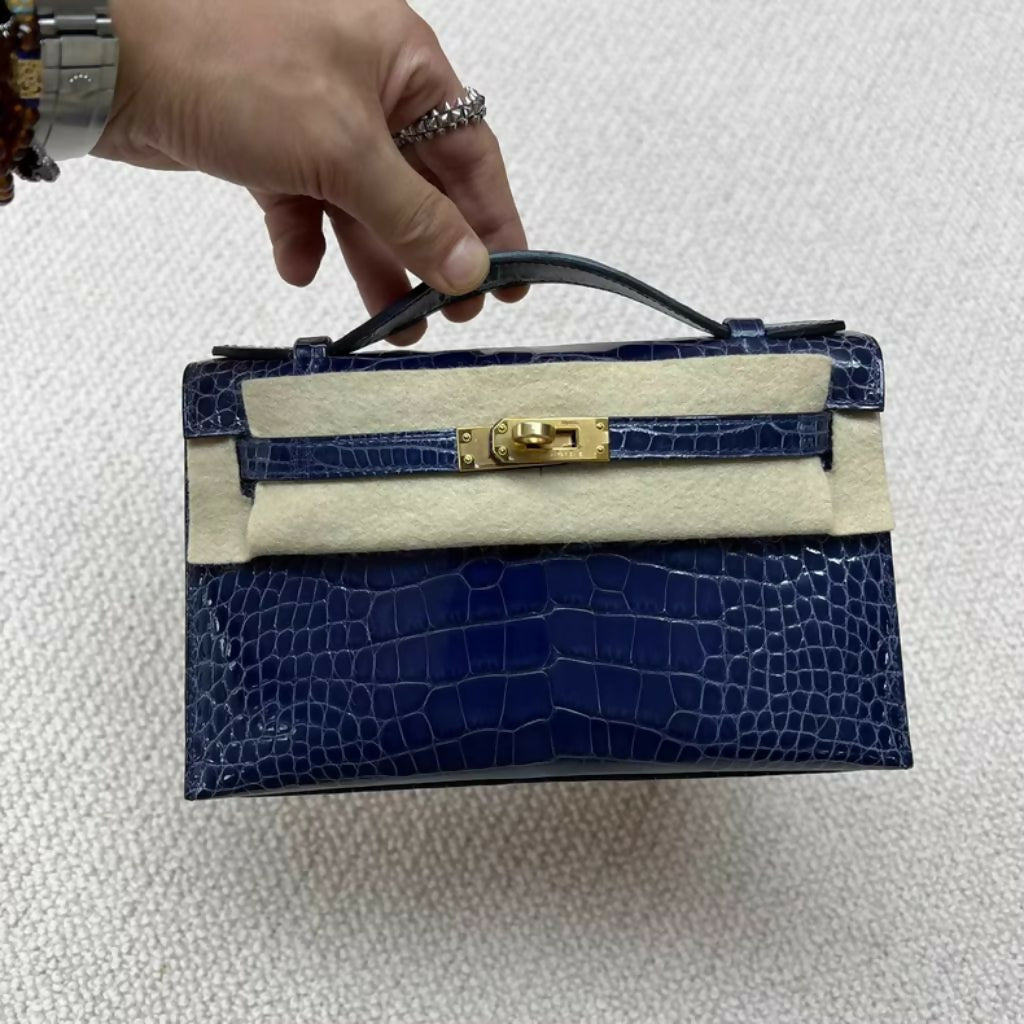 Hermès Mini Kelly Blue Shiny Crocodile with Gold Hardware