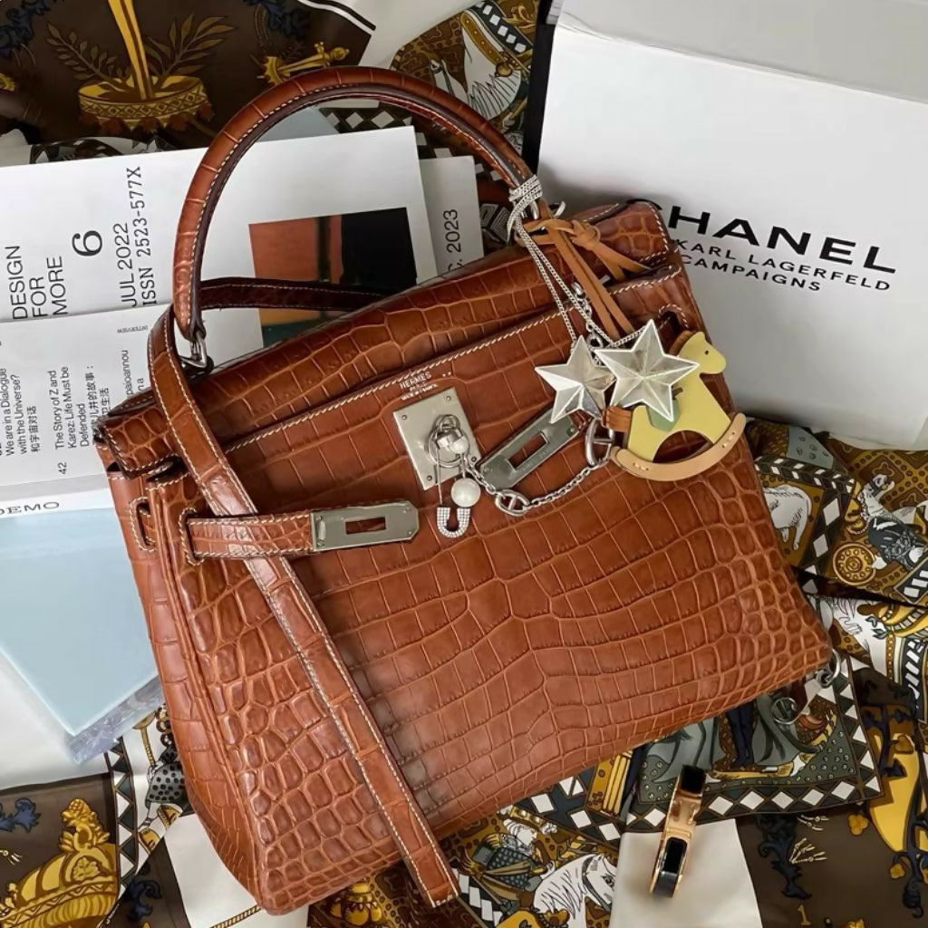 Hermès Kelly 28 Saddle Crocodile leather palladium hardware