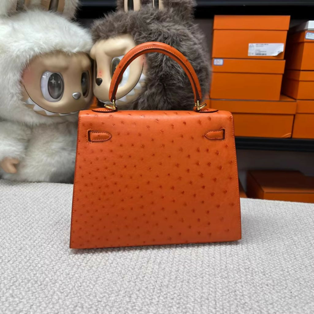 Hermès Kelly 25 Tangerine Orange Ostrich Leather with Gold Hardware