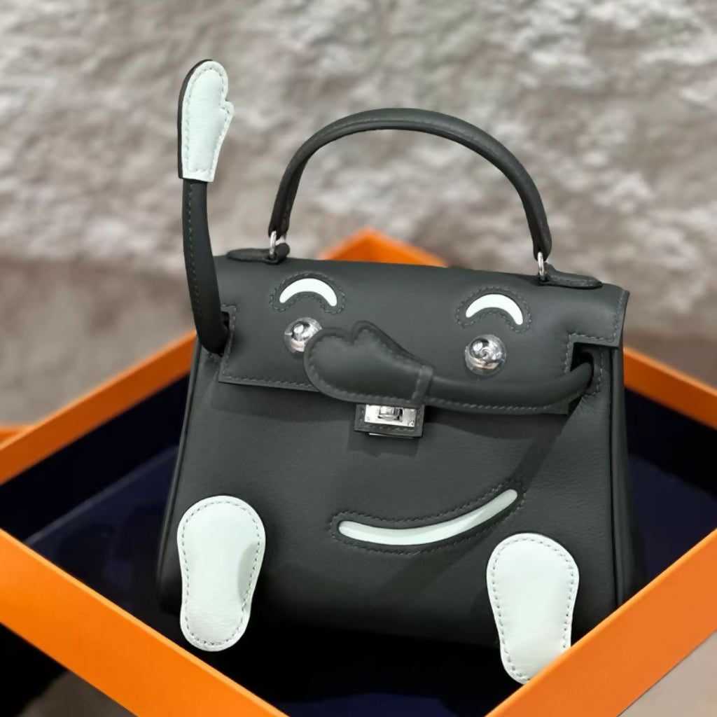 Hermès kelly doll dark green Swift Leather Palladium hardware