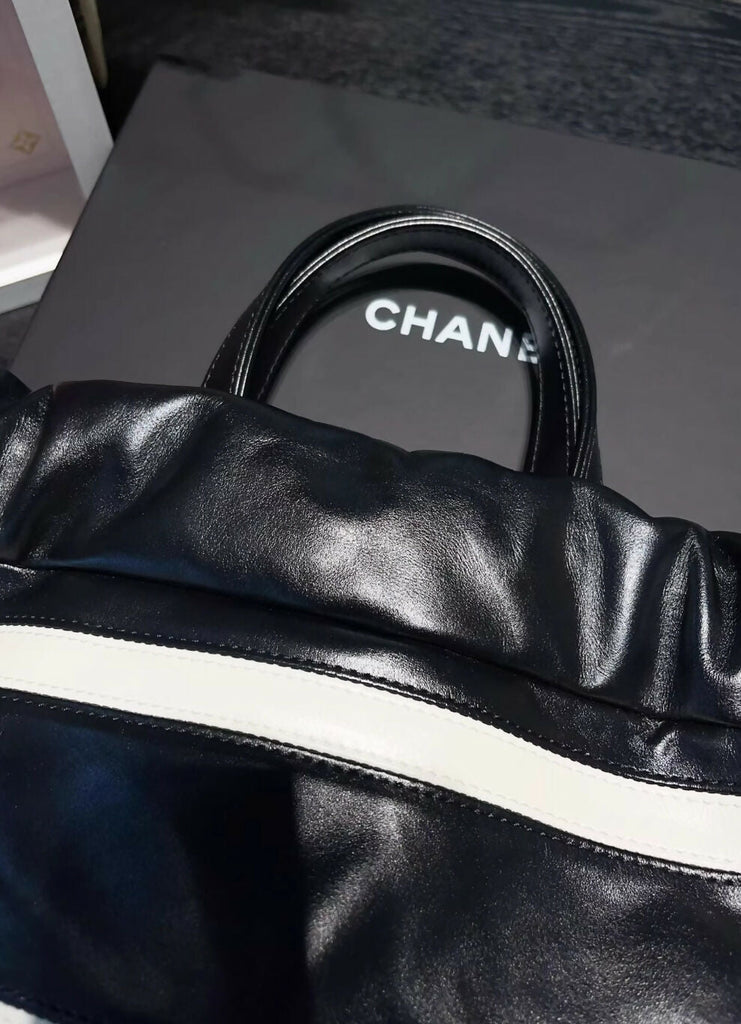 Chanel 24S black & white leather backpack with gold hardware