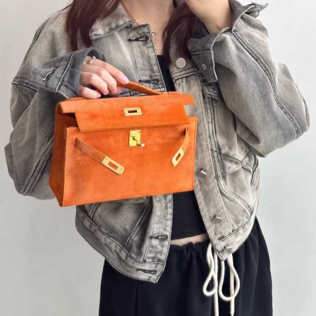 Hermès Mini Kelly pochette Orange doblis gold hardware