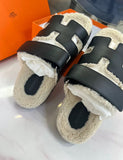 Hermès Black Leather Shearling Chypre Sandals