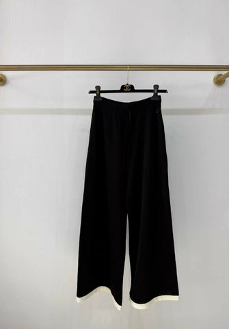 Chanel 25A black wide-leg trousers with white trim