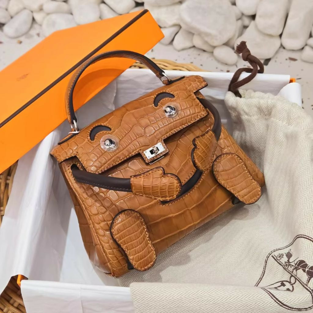 Hermès Quelle Idole Kelly Doll Matte Gold Alligator and Ebene Swift Palladium Hardware