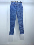Chanel 21B Double C Camellia denim pants